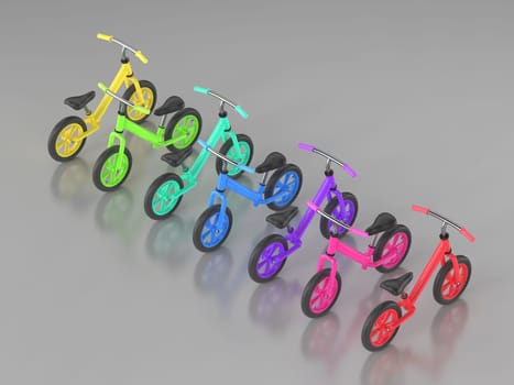 Group of seven different colored children's balance bikes