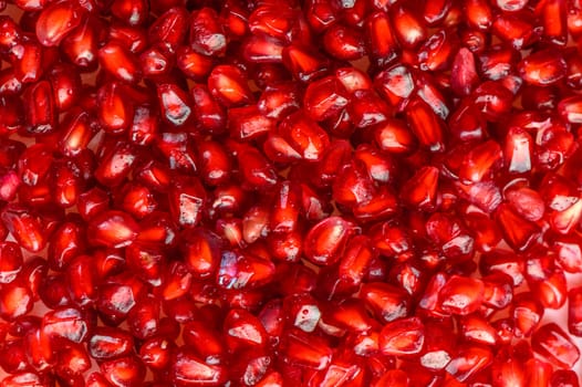 Fresh pomegranate seeds for food background