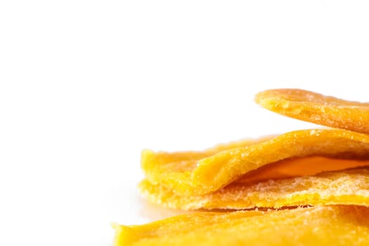 Pile of dried mango slices cut out on transparent background 1
