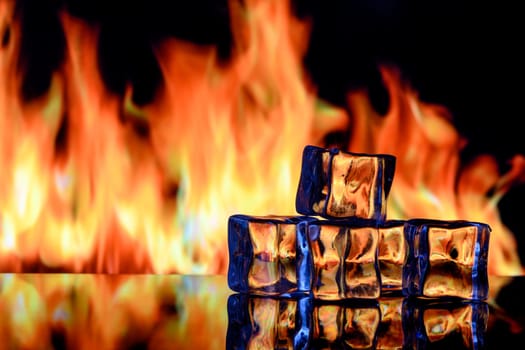 ice cubes on a black background in flames 4