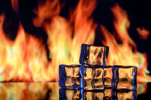 ice cubes on a black background in flames 7