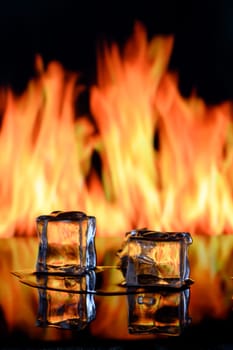 fire and ice cubes on a black background, place under the text 4