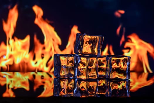 Burning ice cubes on black background 4