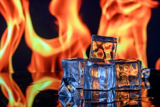 Burning ice cubes on black background 6