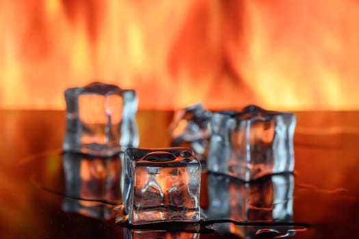 Ice melting with flames on background. 5