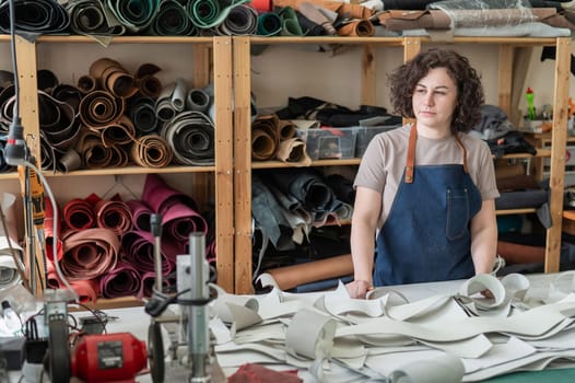 Woman tanner at work in the workshop