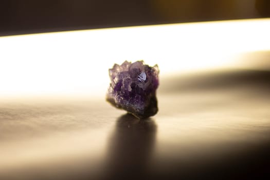 Violet amethyst quartz crystals on black background. High quality photo