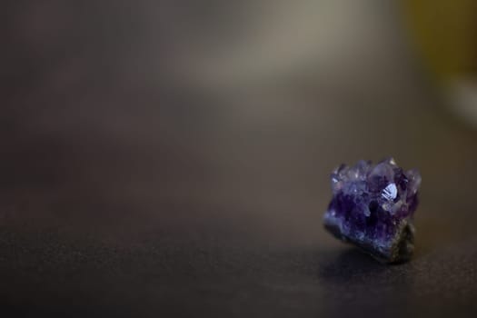 Violet amethyst quartz crystals on black background. High quality photo