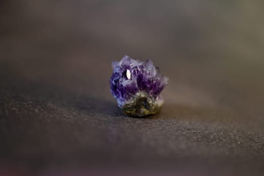 Violet amethyst quartz crystals on black background. High quality photo