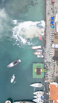 Aerial top view boat be on fire at sea. hq photo
