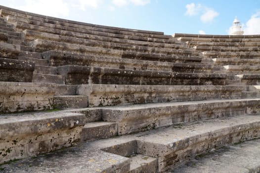 The Ancient Odeon is a functioning ancient theater in the Archaeological Park of Kato Paphos, close-up rows for spectators