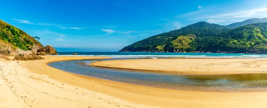 Panoramic photograph of Bonete beach in Ilhabela with the river flowing into the sea