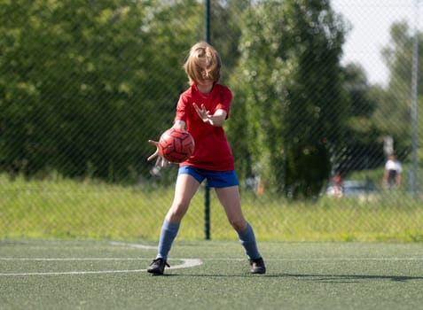 Small Footballer At Summer Match Shows Great Potential