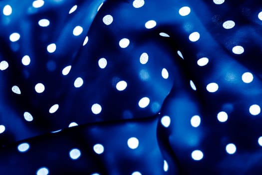 Fashion design, interior decor and vintage material concept - Classic polka dot textile background texture, white dots on blue luxury fabric design pattern