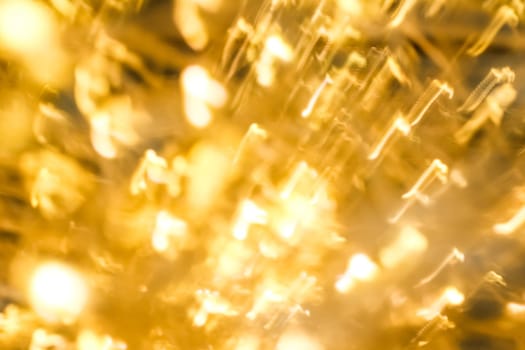 Abstract texture, festive New Year fireworks and Christmas concept - Glamorous golden glitter, luxury holiday background