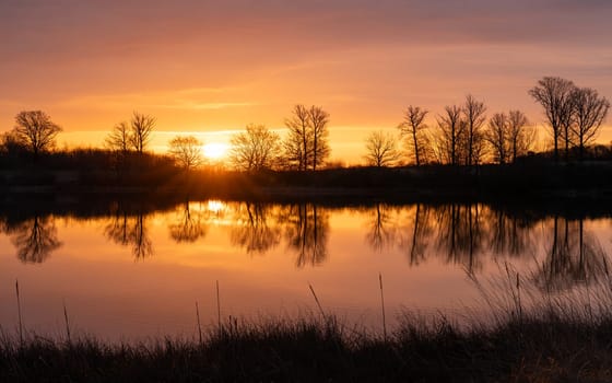 Panoramic image of Rodder lake during sunrise, Eifel, Rhineland-Palatinate, Germany