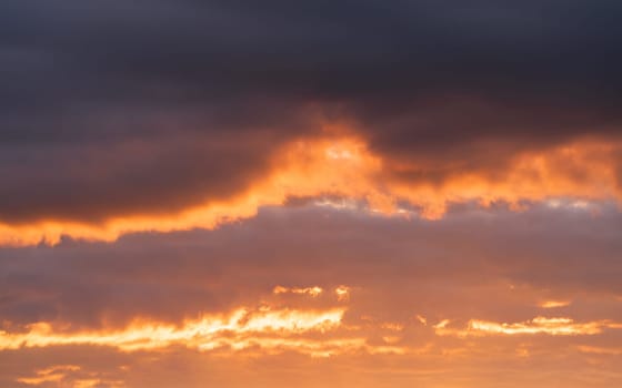 Low angle view to evening sky with dramatic clouds