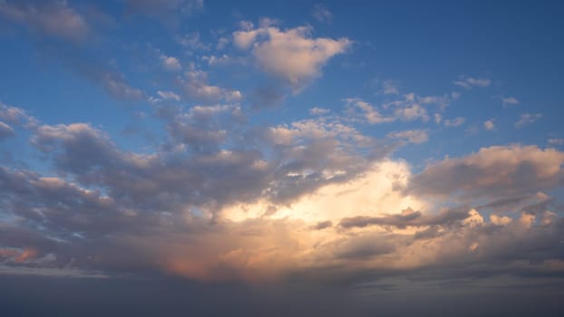 Low angle view to evening sky with dramatic clouds