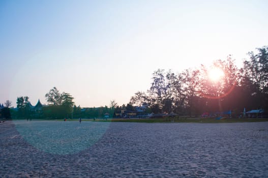 Evening beach outing with shining light background.