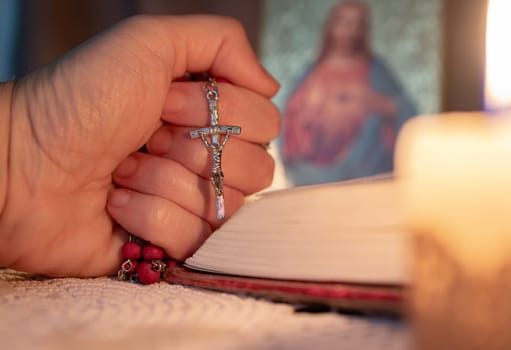 Blurred image of the Sacred Heart in the background..Culture of faith.Prayers of faith. Concept of religion and faith