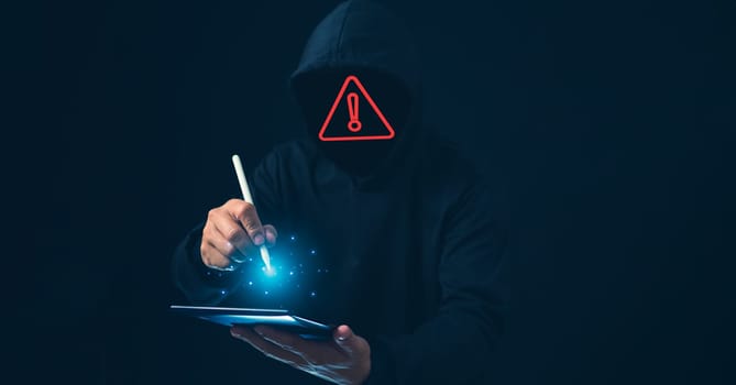 Hackers work on laptops in the dark. The concept of information security in the Internet network and information espionage.