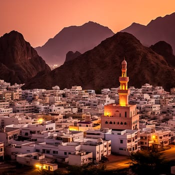 A beautiful city with a large mosque in the background. The water is calm and the sky is orange