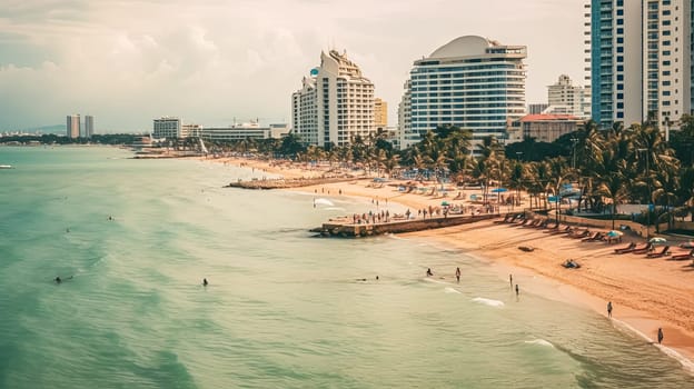 A beach with a lot of people and a beautiful ocean view. Scene is relaxed and peaceful