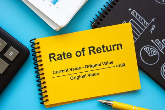 Notebook with rate of return formula.