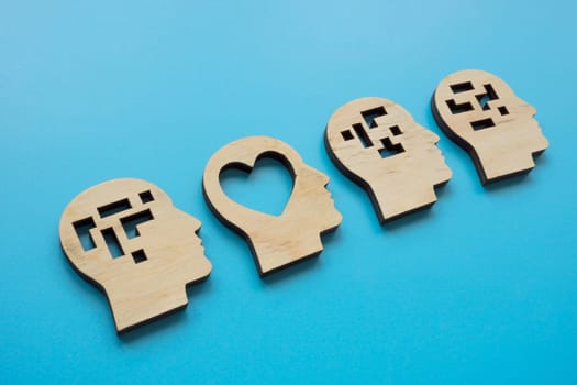 Heads with heart and logical structures. Emotional intelligence concept.