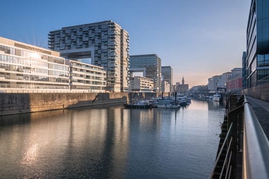 COLOGNE, GERMANY - DECEMBER 15, 2022: Panoramic image of modern buildings in the harbor of Cologne on December 15, 2022 in Germany, Europe