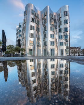 DUSSELDORF, GERMANY - MARCH 25, 2023: Panoramic image of modern buildings in the media harbor of Dusseldorf on March 25, 2023 in Germany, Europe