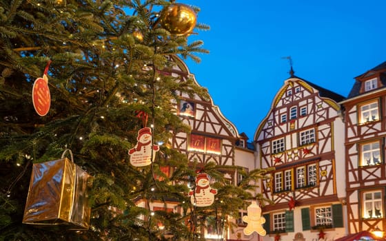 BERNKASTEL-KUES, GERMANY - DECEMBER 17, 2022: Christmas market, Mosell city Bernkastel-Kues with christmas tree and half-timbered houses on December 17, 2022 in Germany