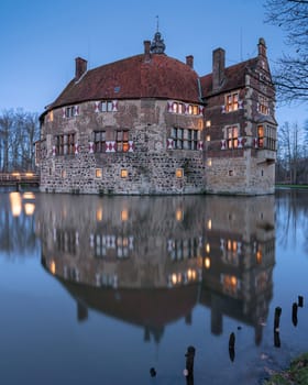 LUEDINGHAUSEN, GERMANY - JANUARY 7, 2023: Vischering castle in evening light on January 7, 2023 in Luedinghausen, Germany