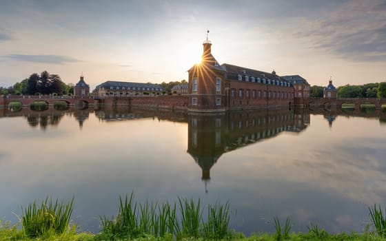 NORDKIRCHEN, GERMANY - JUNE 30, 2023: Nordkirchen castle in evening light on June 30, 2023 in Munsterland, North Rhine Westphalia, Germany