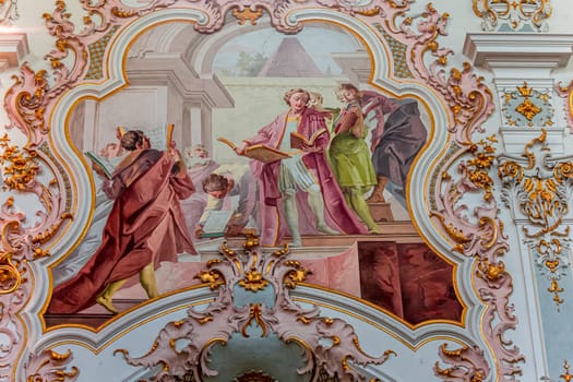 ROTTENBUCH, BAVARIA, GERMANY, JUNE 02, 2022 : interiors, frescoes and architectural decors of  Rottenbuch abbey basilica, by painter Matthaus Gunther and stuccoist Josef Schmuzer, 18th century