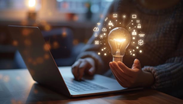 A person is holding a light bulb in front of a laptop by AI generated image.