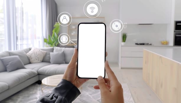 A person is holding a smart phone in a living room with a couch by AI generated image.