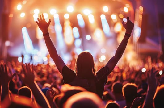 A woman is holding her hand up in the air at a concert by AI generated image.