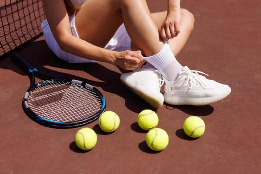 young woman playing tennis on the tennis court, olympic sport, outdoor activity concept