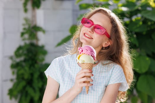 girl eats ice cream balls in hot summer, escape from the girl in pink glasses eats ice cream balls in the hot summer, escape from the heat