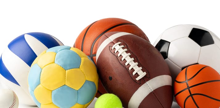 Assorted sports equipment isolated on white background close up