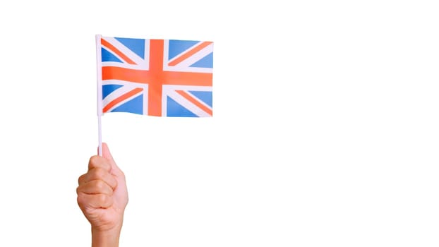 Photo of wind waving a british pennant holding by a hand. Slow Motion video