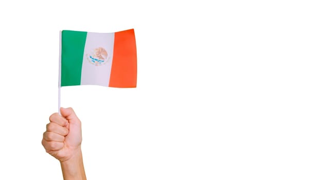 Photo of wind waving a mexican pennant holding by a hand