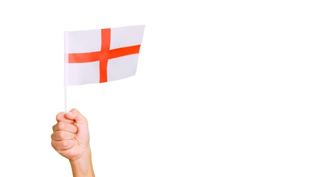 Photo of wind waving a english pennant holding by a hand