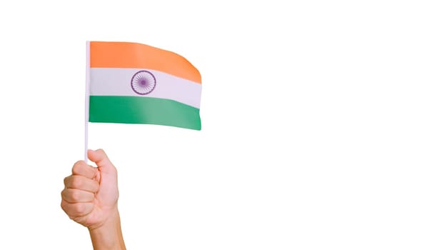 Photo of wind waving a indian pennant holding by a hand