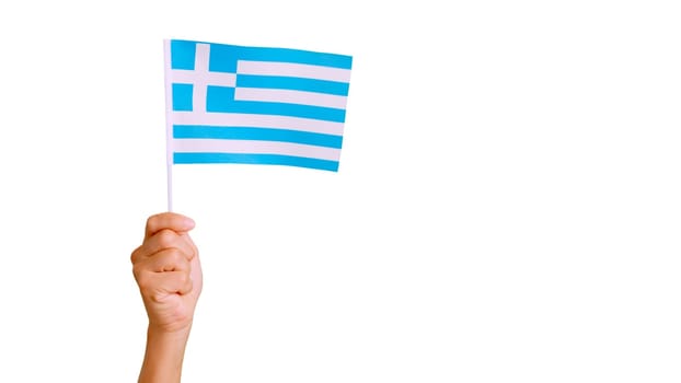 Photo of wind waving a greek pennant holding by a hand