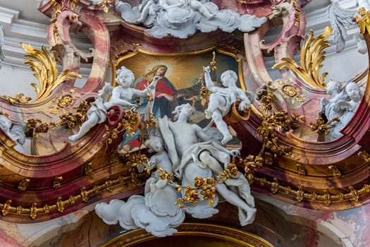 OTTOBEUREN, BAVARIA, GERMANY, JUNE 04, 2022 : Rococo stuccowork statues, by various anonymous artists, 18th century,  in  Ottobeuren abbey basilica