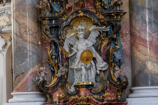 OTTOBEUREN, BAVARIA, GERMANY, JUNE 04, 2022 : Rococo stuccowork statues, by various anonymous artists, 18th century,  in  Ottobeuren abbey basilica