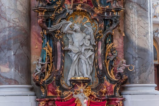 OTTOBEUREN, BAVARIA, GERMANY, JUNE 04, 2022 : Rococo stuccowork statues, by various anonymous artists, 18th century,  in  Ottobeuren abbey basilica