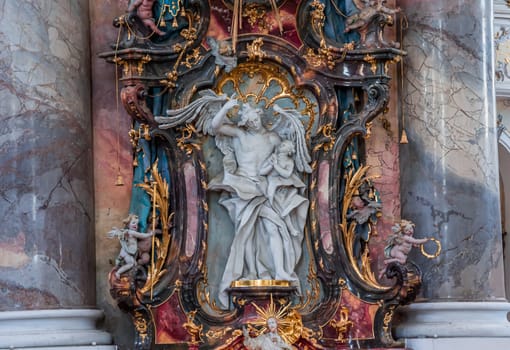 OTTOBEUREN, BAVARIA, GERMANY, JUNE 04, 2022 : Rococo stuccowork statues, by various anonymous artists, 18th century,  in  Ottobeuren abbey basilica